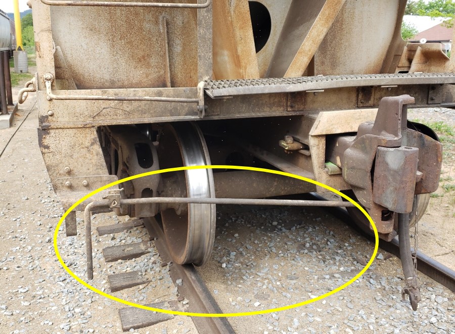 Typical freight car uncoupling lever (Source: TSB)